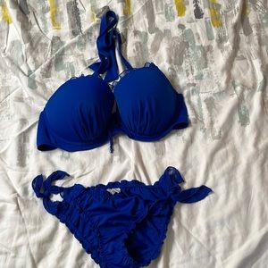 Blue 2 piece bathing suit. Never worn, no tags. Can be sold separately.
